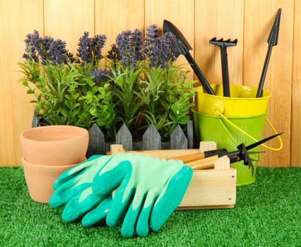 Trained gardening staff in Hackney Wick wearing PPE during maintenance work